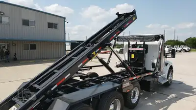 New | in-Stock 2027 PETERBILT 548 Rolloff Trucks Texas US | Roll Off Truck World #1492013