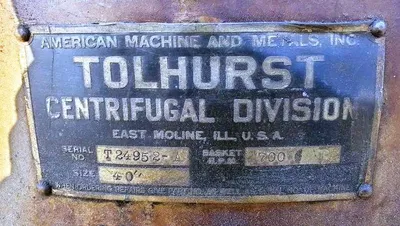 Tolhurst 40" Center-Slung chip wringer.