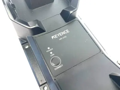 USED KEYENCE RUGGED INDUSTRIAL HANDHELD CODE READER, WIRELESS MODELS CRADLE
