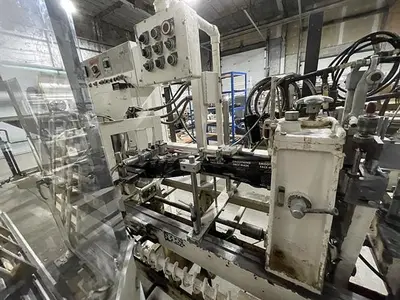 Bartelt model IM7 Pouch Packager with AMS Auger Filler and  liquid filler