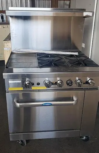 Unused Cook Rite 4 burner gas/propane 12" Griddle and oven - SPECIAL CLEARANCE
