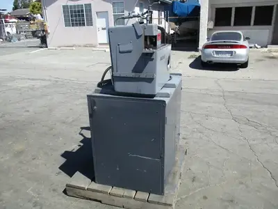 Struers / Discotom Metallurgical Saw with Coolant Pump