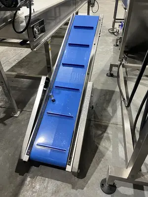 Incline Cleated Take-Away Conveyor