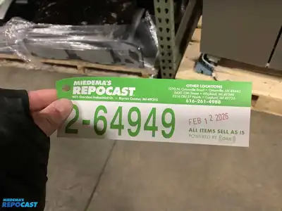 Lot of various car parts including Tesla storage bins, a sunroof deflector, mud flaps, a Colorado...