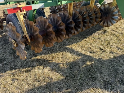 (1) Shop Built, approx. 12.5’ width vertical tillage disc with (4) frame mounted weights on a John D...