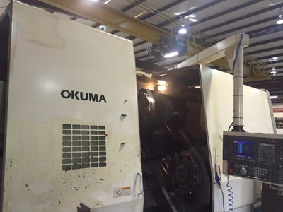 USED 1995 OKUMA IMPACT