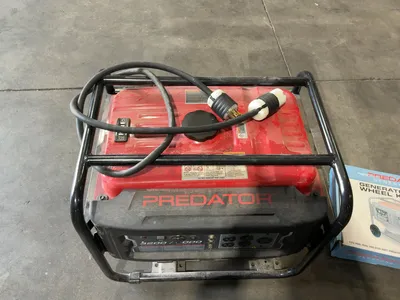 USED PREDATOR 4000 WATT MAX GAS GENERATOR WITH WHEEL KIT