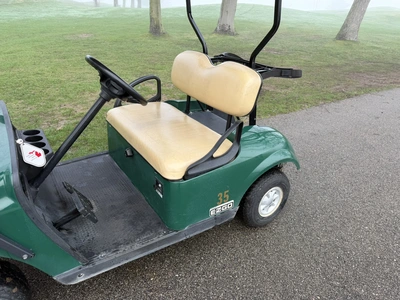 (1) 2017 E-Z-Go golf cart with a Kawasaki gas engine, model 625111G01, includes canopy, ball cover, ...