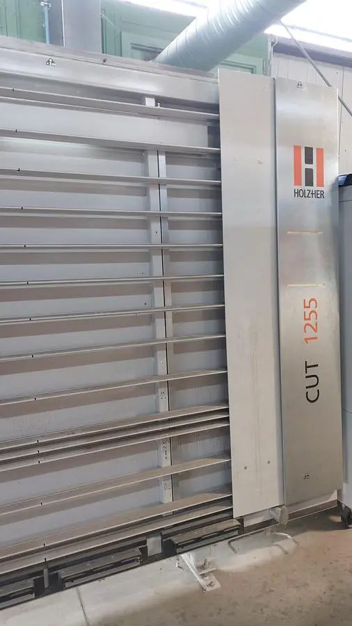 USED 2011 HOLZHER 1255