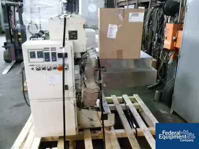 USED OMEGA OMEGA SHRINK BUNDLER, MODEL DL 27