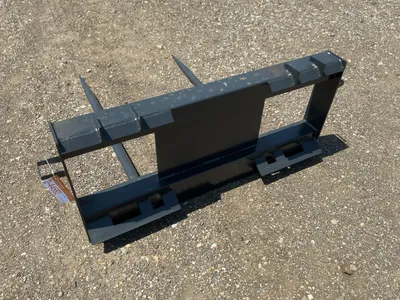 New JCT Bale Spear Skid Steer Attachment, Universal Quick Attach, Has Two Spears that Stick Out Appr...