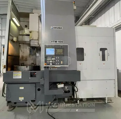 USED 2011 OKUMA VTM-100