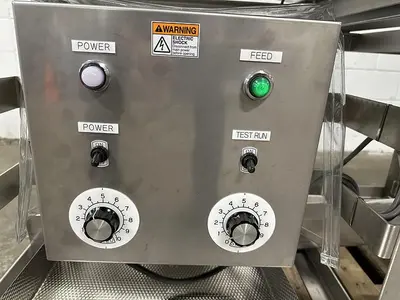 Vibratory Conveyor with Spray Nozzles