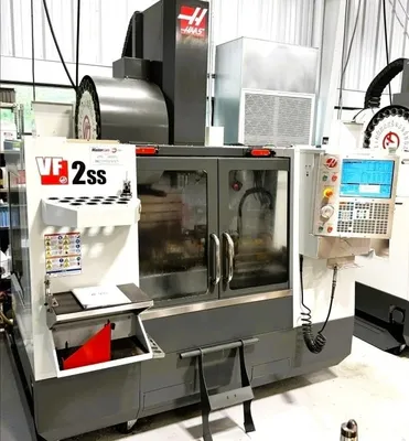 HAAS VF-2SS 5-Axis with HAAS T5C 5-Axis Rotary Table Vertical Machining Centers (5-Axis or More) | Bayou Machinery (1)