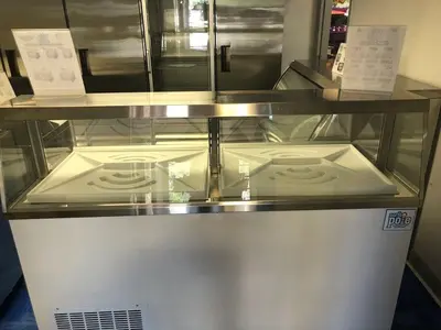 Elite 67 3/4" 12 Tub White Deluxe Ice Cream Dipping Cabinet