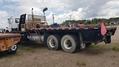 USED 1980 MACK DM600 TWIN STEER HEAVY DUTY OILFIELD PUMP / KILL TRUCK