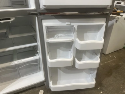 USED GE FREEZER ON TOP