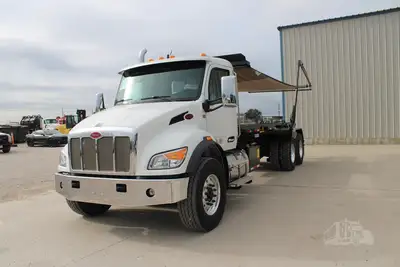 New | in-Stock 2027 PETERBILT 548 Rolloff Trucks Texas US | Roll Off Truck World #1492000