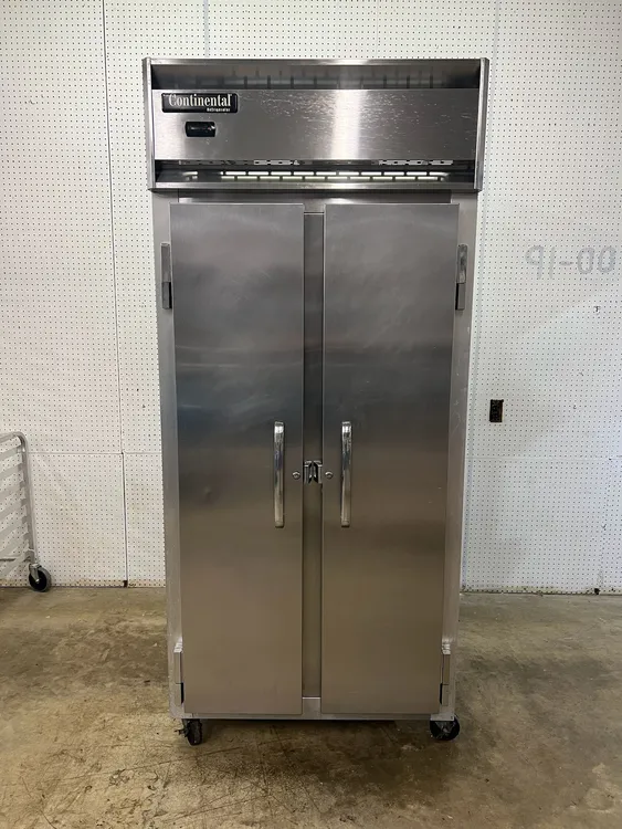 Used Continental Used Continental 2RSEN 36 1/4" Two Section Reach In Refrigerator Solid Doors 115v Refrigerators Illinois US | Falcon Restaurant Supply #1374959