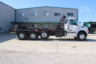 New | in-Stock 2027 PETERBILT 548 Rolloff Trucks Texas US | Roll Off Truck World #1492012