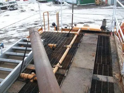 USED 20 M3 (120 BBL) SKID MOUNTED 2 COMPARTMENT MUD TANK
