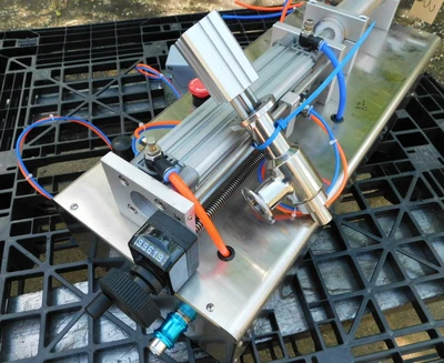 USED SINGLE PISTON FILLER SINGLE PISTON