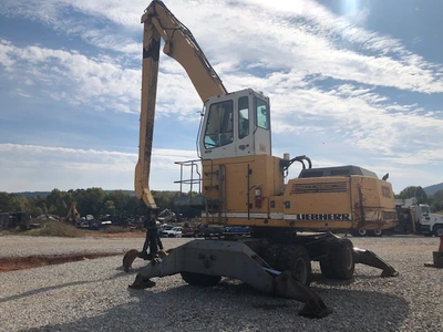 Liebherr 932 Material Handler with Grapple and Magnet