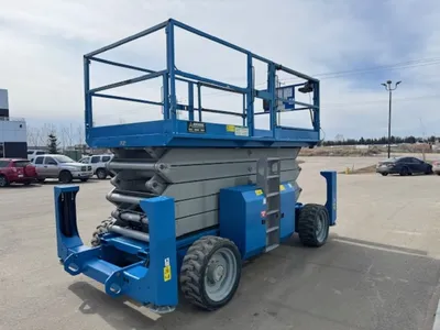 Used 2012 GENIE GS-5390RT ROUGH TERRAIN SCISSOR LIFT Scissor Lifters Alberta CA | Adcock Equipment #1418050