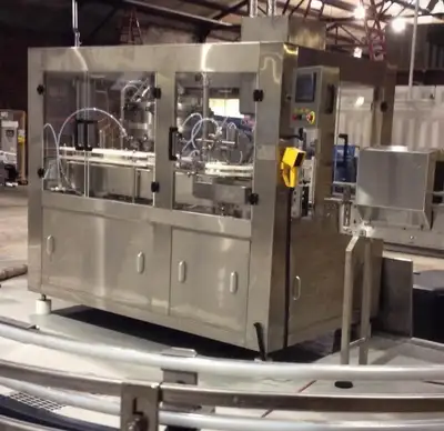 (Reduced!) Palmer 12-Head Rotary Isobaric Canning Line – 35 CPM