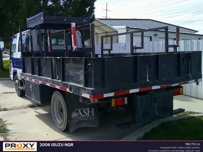 Used 2006 ISUZU NQR Flatbed Trucks Utah US | Proxy Equipment #1378481