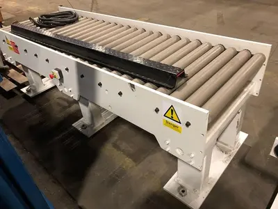 USED SRC SYSTEMS LTD. FINISHED ROLL UNLOADING SYSTEM