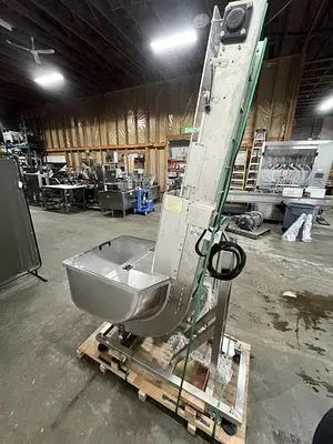Automatic Cap Elevator
