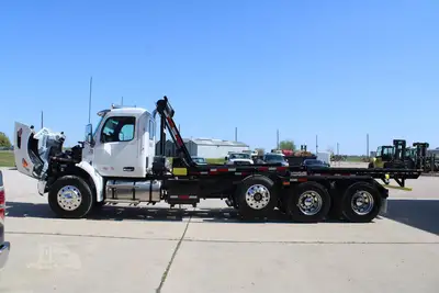 New | in-Stock 2027 PETERBILT 548 Rolloff Trucks Texas US | Roll Off Truck World #1492012