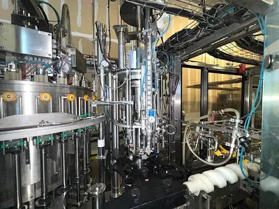 Complete KOSME Bottling Line Includes Depalletizer, Barifill Glass Filler & Flexa Labeler