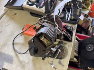 (1) Oregon chainsaw sharpener with assorted chainsaw chain.
