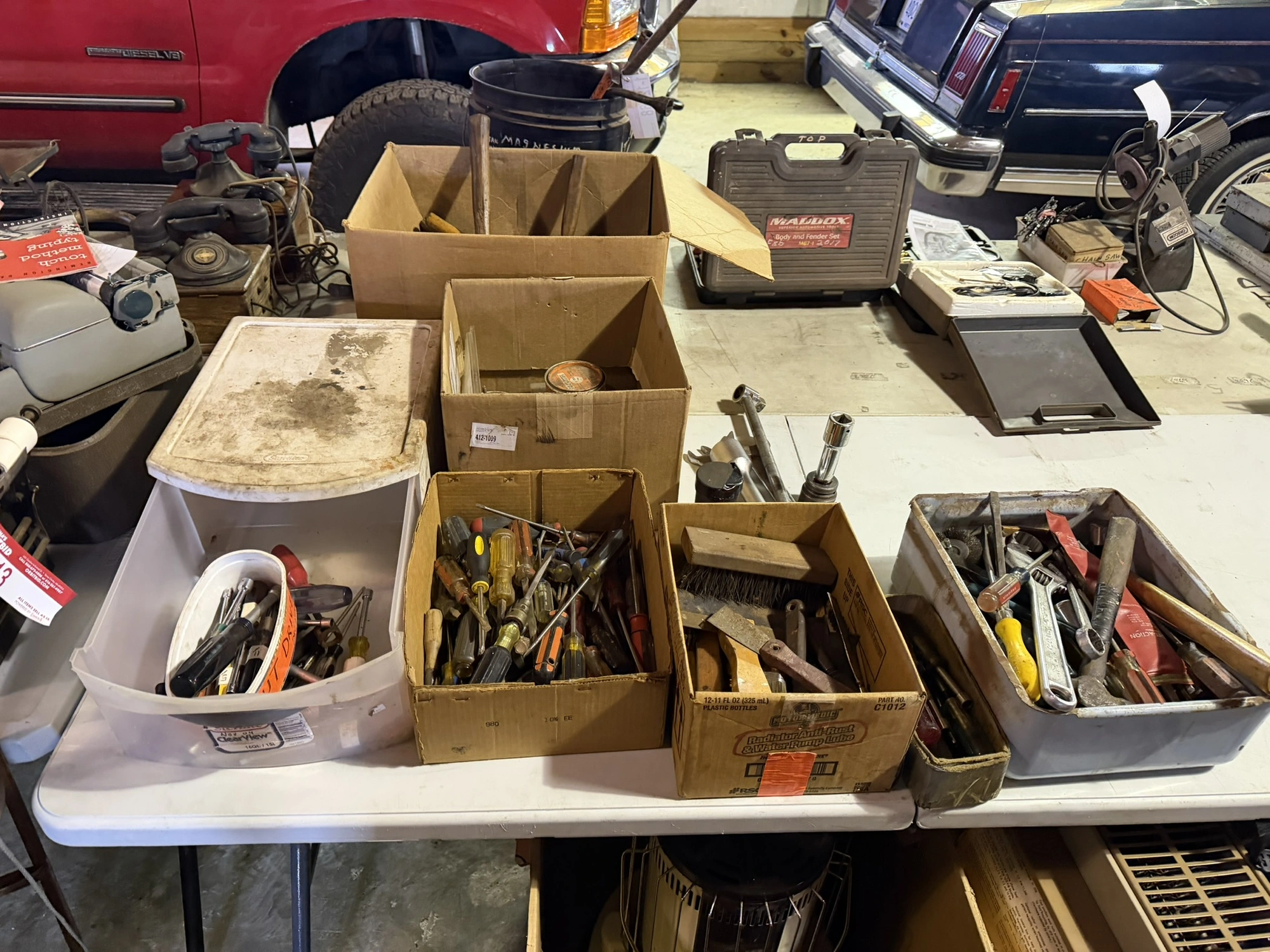 Large lot of assorted hand tools, includes sockets, wrenches, screwdrivers, nut drivers, brushes, an...