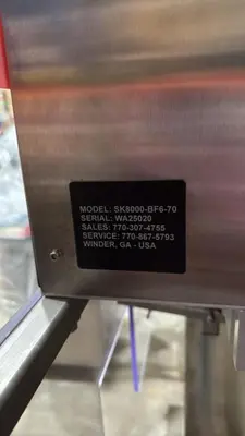 USED SUREKAP MODEL SK8000-BF6-70 AUTOMATIC SPINDLE CAPPER SUREKAP MODEL SK8000-BF6-70 AUTOMATIC SPINDLE CAPPER