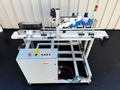 FoxJet Pressure Sensitive Spot or Wrap Around Labeler