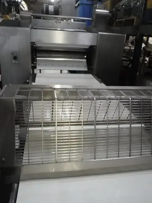 USED STAINLESS STEEL MOLINE 38-FOOT SHEETER LINE WITH EXTRUDER