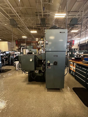 USED 2006 Weldon UGC, Two Spindle, Fanuc 21i-TB CNC, Robot