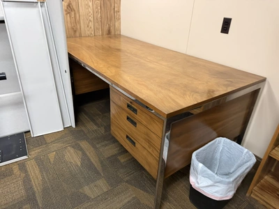 Contents of office furniture, includes (1) 78" wooden desk, (1) credenza, 74" x 18.5", and (2) woode...