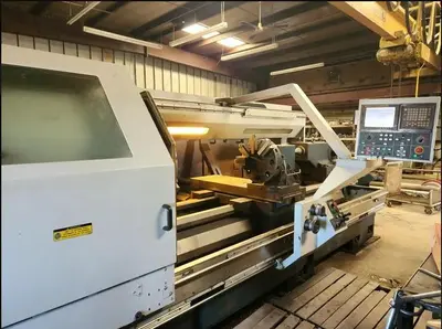 USED 2006 ROMI M33 X 80"