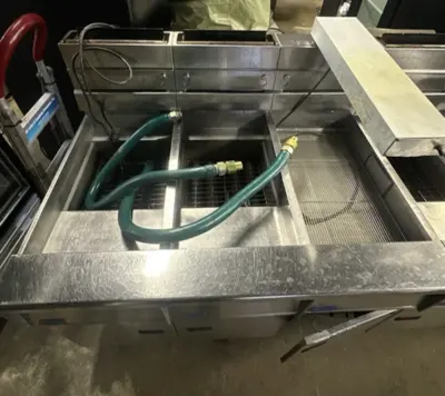 174-0002 Pitco SSH55 and SSHBN55 Battery of 4 Fryers with Middle Dump Station an