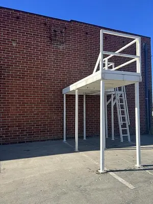 USED HEAVY DUTY CORNER MEZZANINE / MACHINE PLATFORM  154" X  117" X  136"