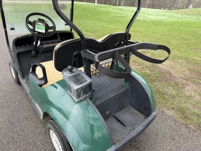 (1) 2015 E-Z-Go golf cart with a Kawasaki gas engine, does not include Club canopy, includes ball wa...