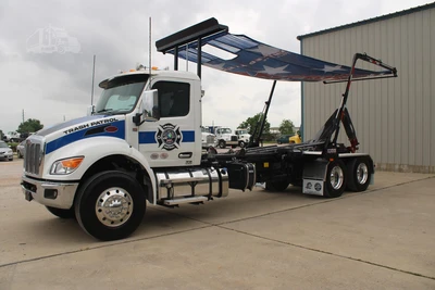 Used 2027 PETERBILT 548 Hooklifts & Roll-Offs Texas US | Roll Off Truck World #1491992