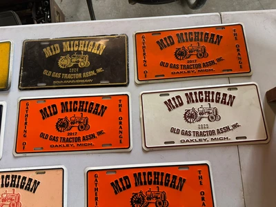 (8) Assorted license plates