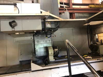 USED OKUMA MILLAC 1052V