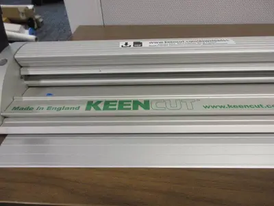 KEEN CUT 70" BENCH TOP PAPER CUTTER.