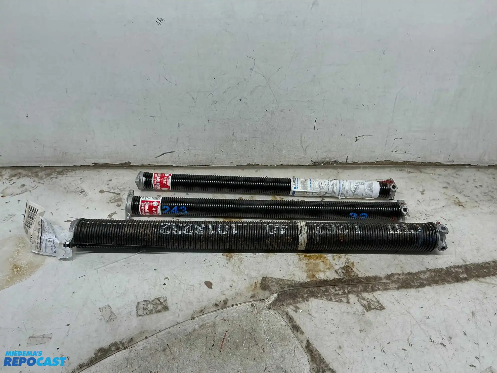 Lot of (3) Sectional Garage Door Torsion Springs (2”, 2”, and 3” Outer Diameter) (32”, 32”, and...